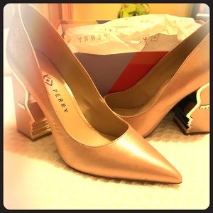 Brand new Rose metallic Katy Perry pumps size 9M.